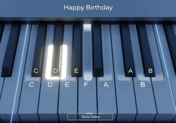 Virtual piano keys showing "Happy Birthday" notes C-G.